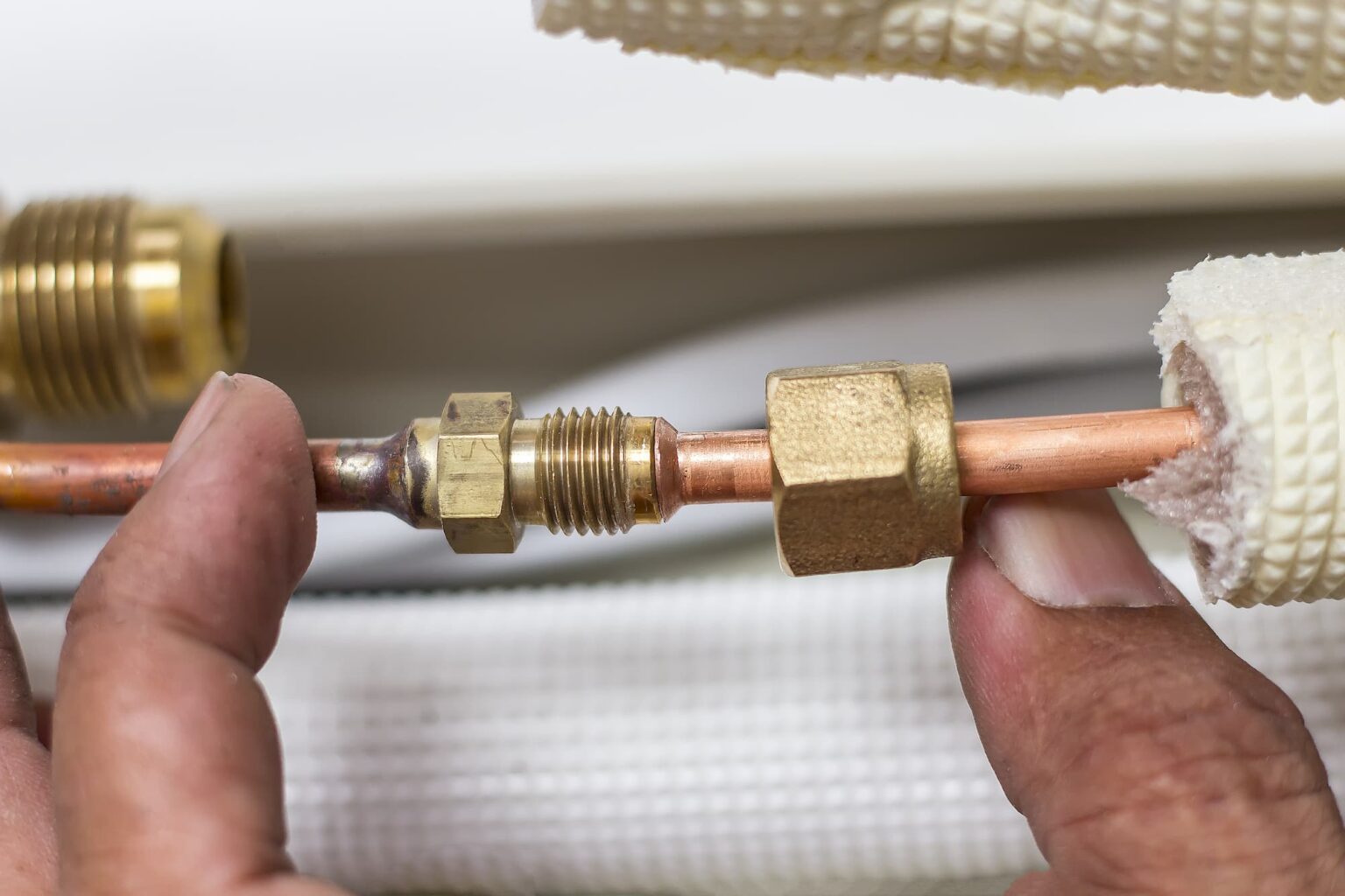 Day and Night Air showing frozen pipes on an air conditioner